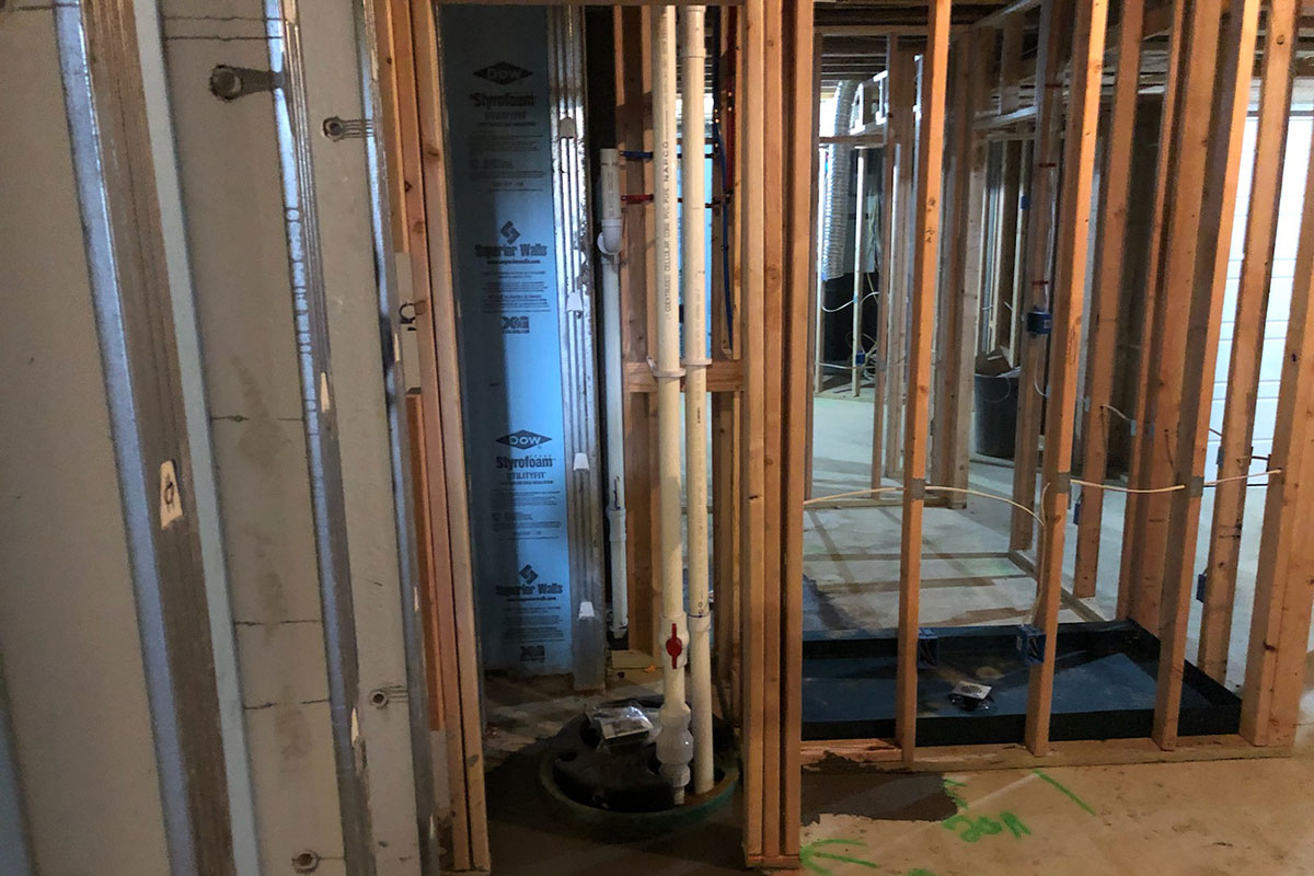 Totally Plumbing - Rough plumbing installation including ejector tank for full bathroom in a finished basement - Rumson, New Jersey – January 2020