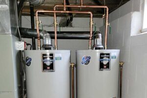 Totally Plumbing - Tandem direct vent gas water heater installation with new gas and water lines - Freehold, New Jersey – May 2022