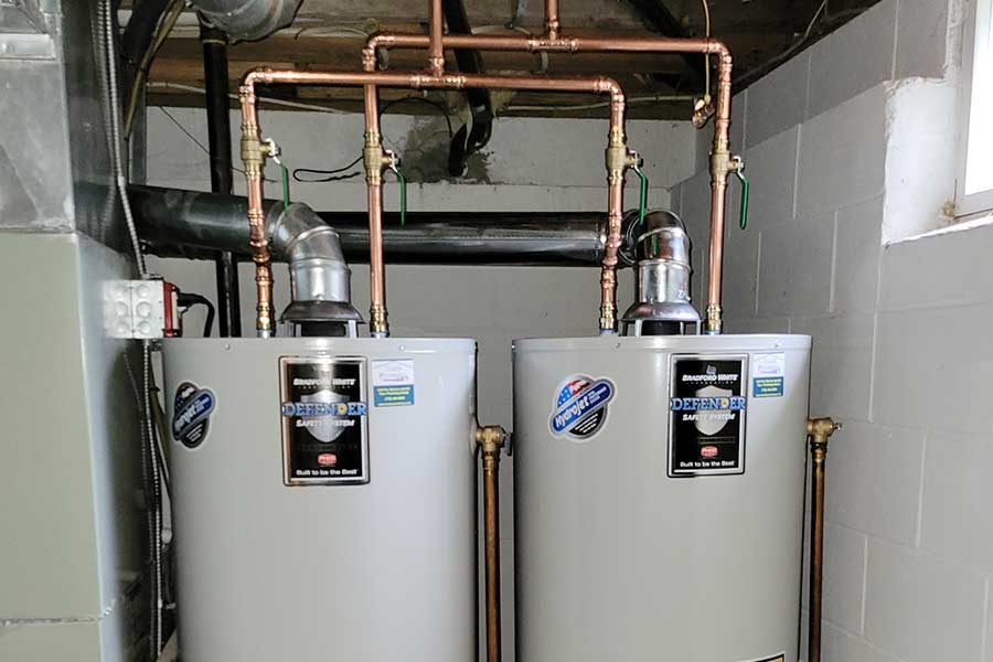 Totally Plumbing - Tandem direct vent gas water heater installation with new gas and water lines - Freehold, New Jersey – May 2022